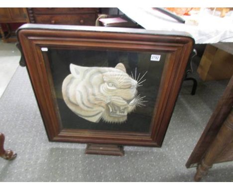 A mahogany firescreen with 'silk' tiger's head, COLLECT ONLY.