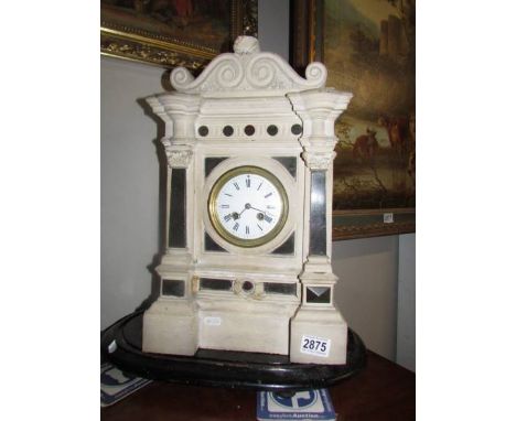 A heavy mantel clock, movement good, porcelain dial has cracks, in working order. COLLECT ONLY.