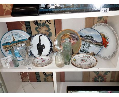 A quantity of plates and bottles etc.