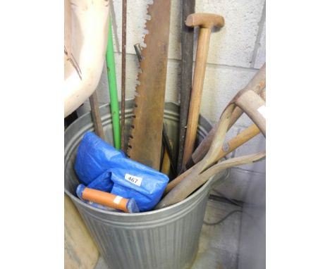 A dustbin containing 10 garden tools and 2 saws. COLLECT ONLY.