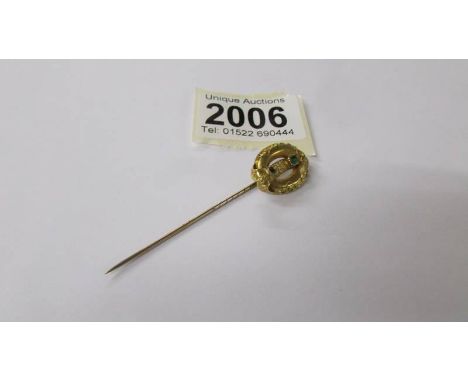 A superb quality antique stick pin (tests as gold, possibly 24k), 2.2 grams.