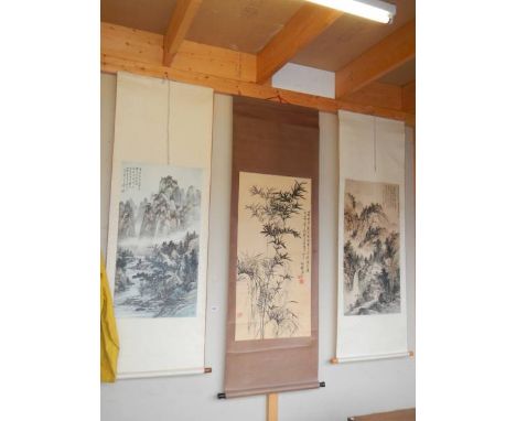 Three signed Chinese scroll paintings.*CONDITION REPORT*Overall in good/fair condition.There are a couple of broom marks on t