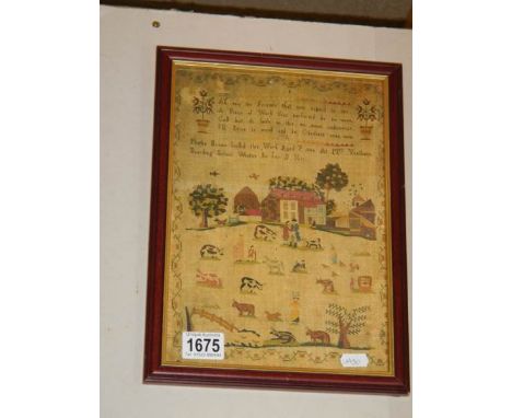 A framed and glazed print of a sampler.