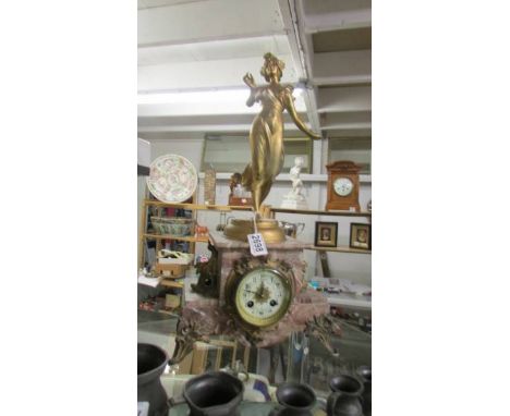 A French marble and ormulu 8 day mantle clock surmounted female figure, in working order. COLLECT ONLY.
