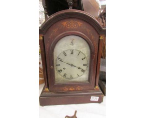 A mahogany inlaid bracket clock. COLLECT ONLY.