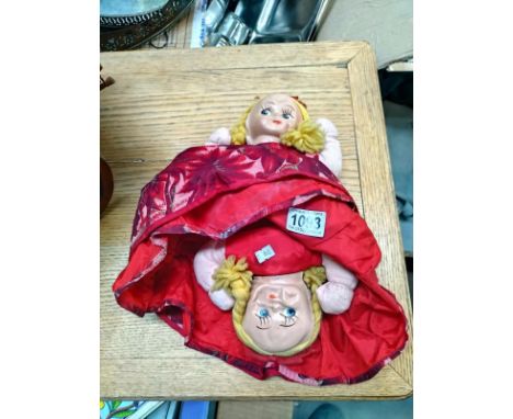 A vintage 2 headed cloth doll