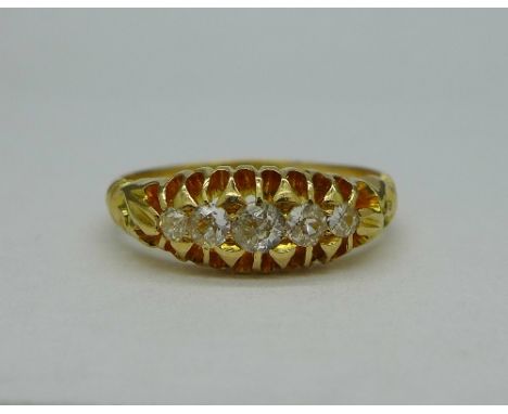 An 18ct gold and five stone diamond ring, Birmingham 1912, weight 3.1g, size N