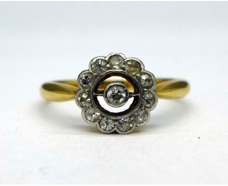 An 18ct gold and diamond ring, weight 2.6g, size M