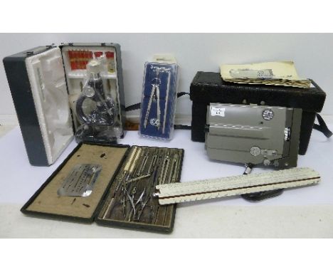 A Minoltina-8 cine camera, boxed, a microscope, a drawing set, a Staedtler Mars Masterbow drawing tool and a rule