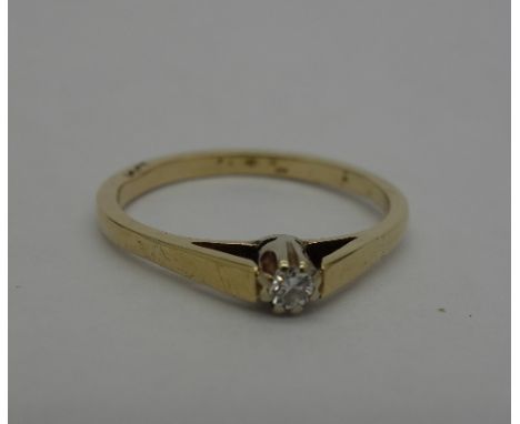 An 18ct gold, diamond solitaire ring, weight 1.7g, size M