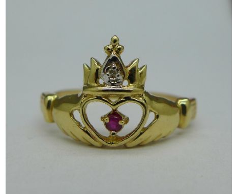 A 9ct gold, ruby and diamond claddah ring, weight 1.1g, size N