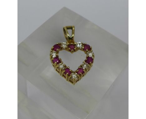 A 9ct gold ruby and white stone heart shaped pendant, weight 1.3g