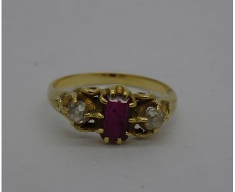 A yellow metal, ruby and diamond ring, weight 3.7g, size O