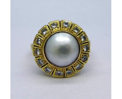 An 18ct gold, diamond and blister pearl ring, weight 7.5g, size Q, diameter 16mm