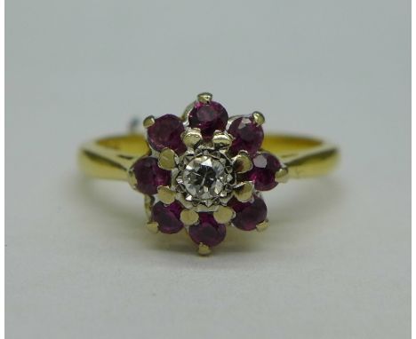 An 18ct gold, diamond and ruby cluster ring, weight 3.2g, size K
