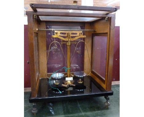 A set of Oertling Ltd., London, chemists scales