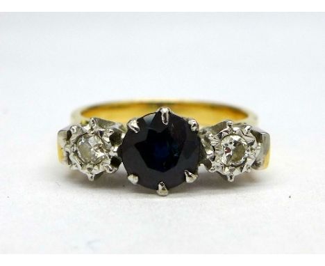 An 18ct gold, sapphire and diamond ring, weight 4.2g, size L