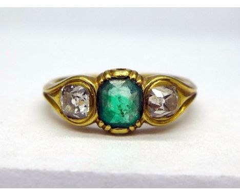 A yellow metal set, diamond and emerald ring, weight 4.4g, size L, over 0.5ct total diamond weight