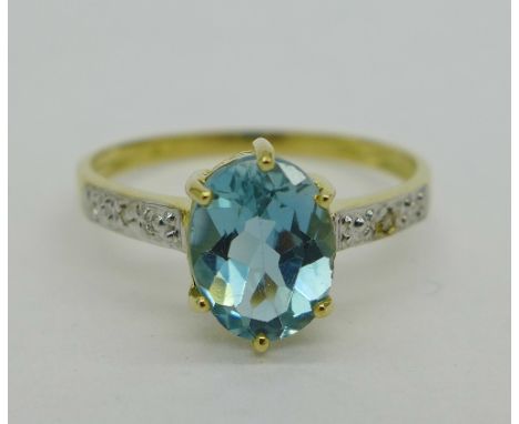 A 9ct gold, blue stone and diamond ring, weight 1.5g, size O