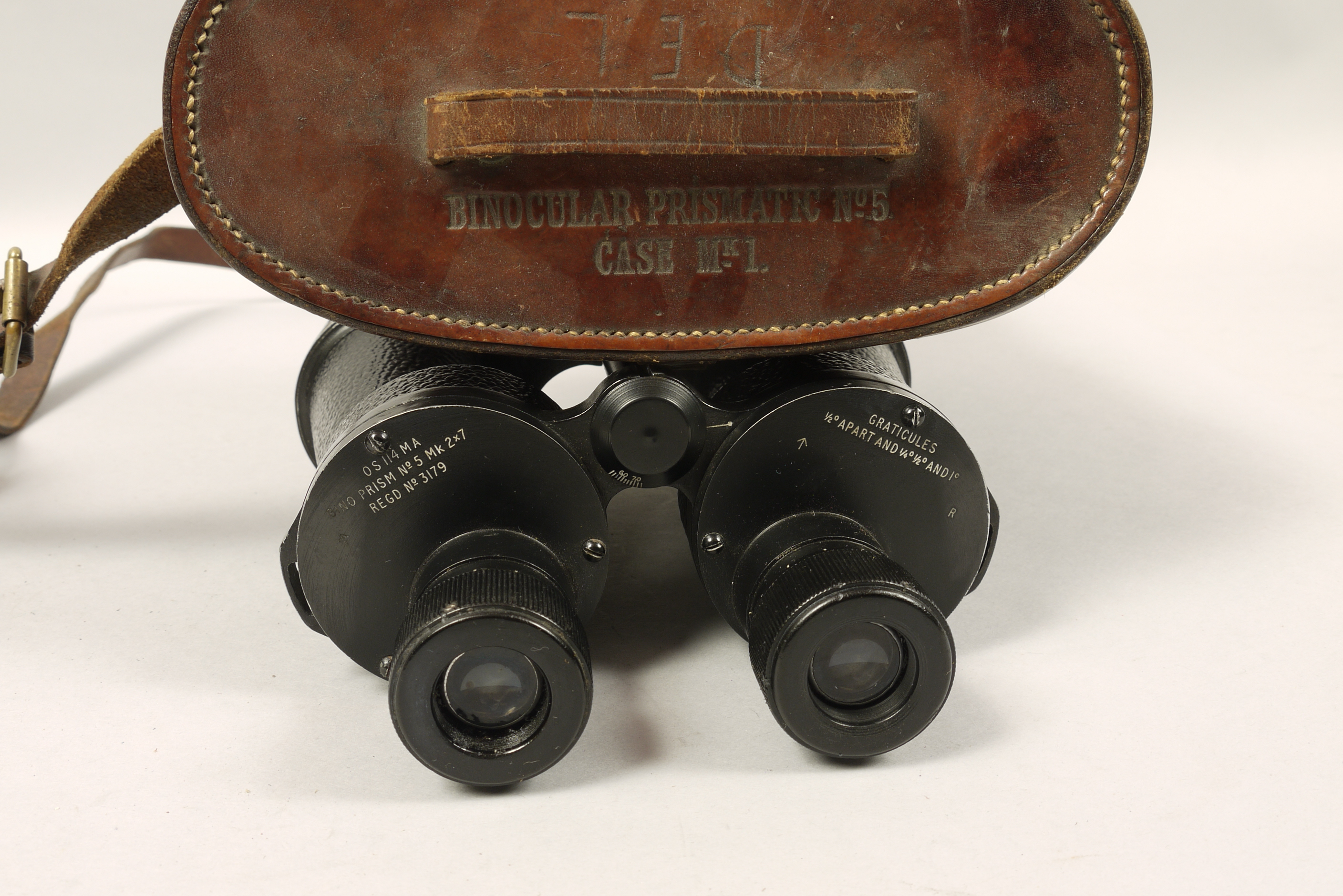 Vintage WWII British military binoculars 'OS 114 MA BINO PRISM No.5, Mk 2 x 7', Regd No.3179, in