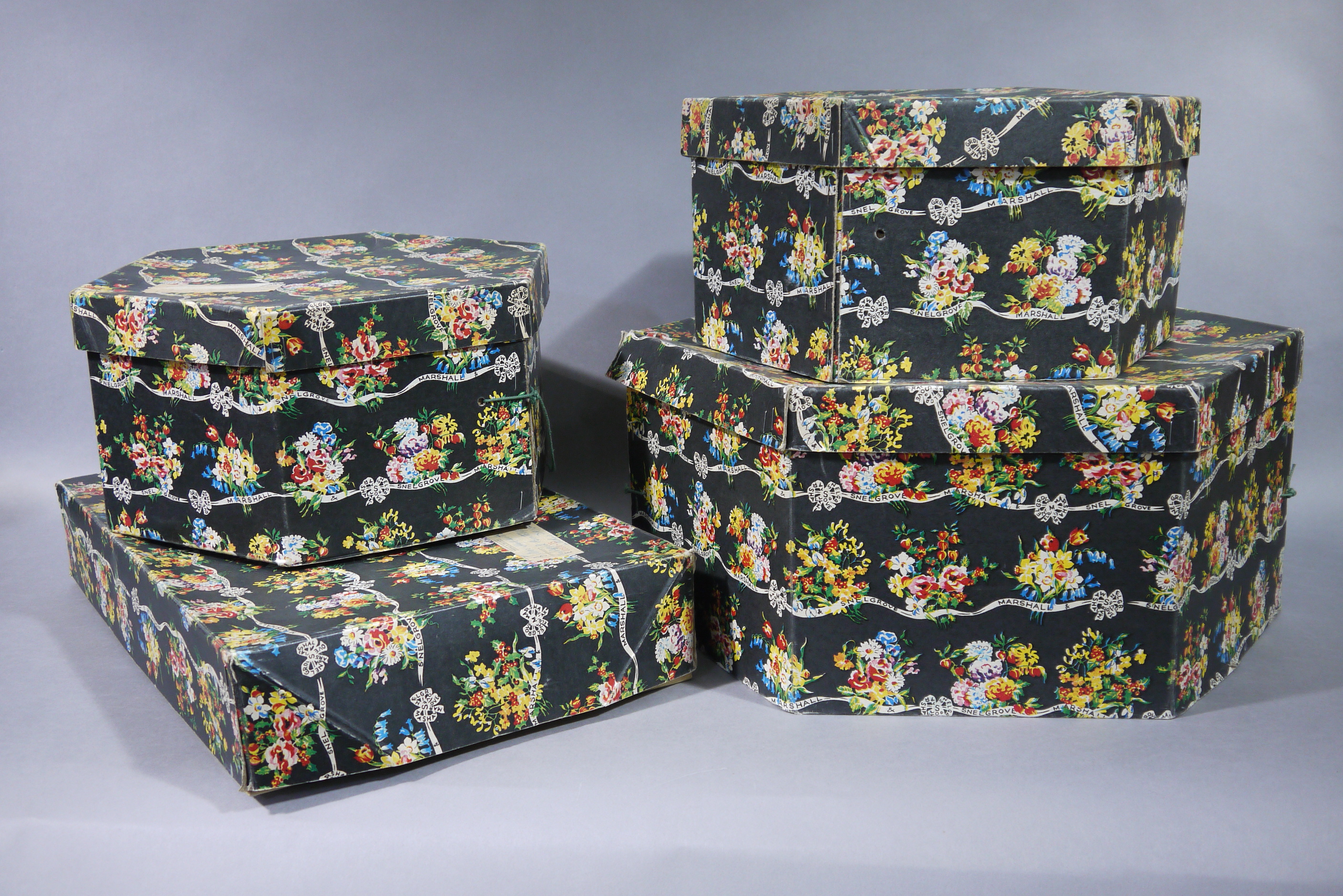 Three Marshall and Snelgrove hat boxes, hexagonal, 35cm (2) and 45cm