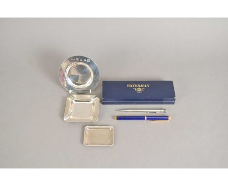 A white metal engine turned retractable pencil, together with a Watermans fountain pen, a white metal pin dish stamped ‘800’,