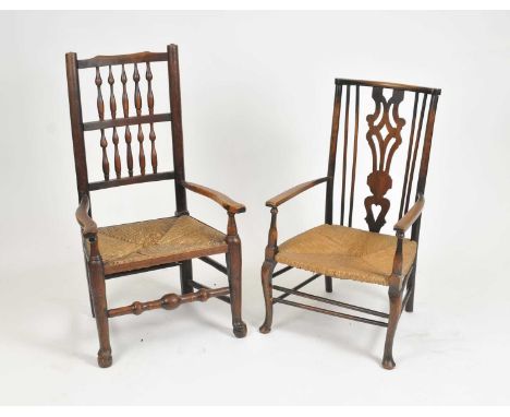 An oak spindle-back rush seated armchair with a turned bobbin rail stretcher, 95 cm, 53 cm wide, 36 cm seat height, together 