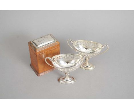 A pair of silver mounted pedestal bon bon dishes, Synyer &amp; Beddoes, Birmingham 1911, 11cm high, total weight approx 5.5oz