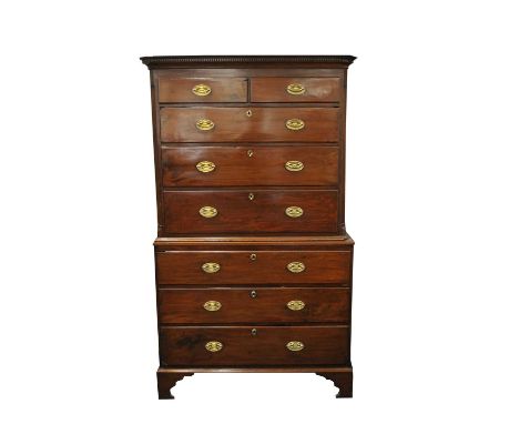 A 19 th century mahogany chest on chest, with a dentil cornice above two short and three long graduated drawers, over three f