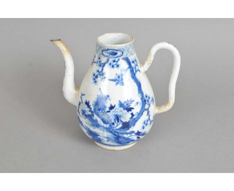 A Chinese blue and white coffee pot, decorated with birds amongst flowers and foliage, with Kangxi marks to underside (lackin