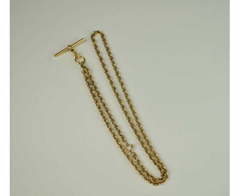 A yellow metal chain necklace with bolt ring clasp, not stamped, with attached 18ct gold T-bar