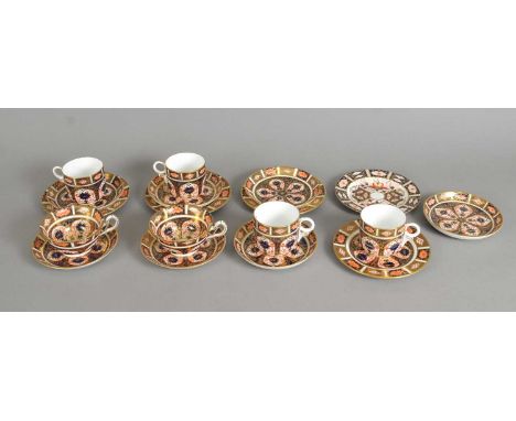 A Royal Crown Derby imari part tea/coffee service early 20th century comprising two teacups, four coffee cups, seven saucers 