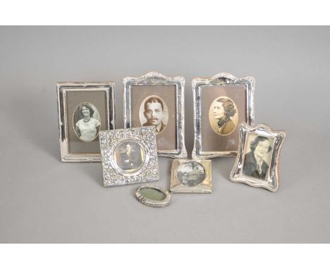 A pair of silver mounted photograph frames, W J Myatt &amp; Co, Birmingham 1919, together with five further silver mounted fr