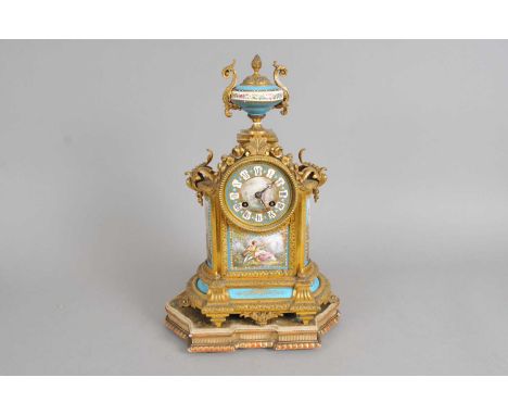 A small 19th century French mantle clock, with a painted porcelain dial signed indistinctly ‘ Cumberbirch &amp; Dutton, Paris