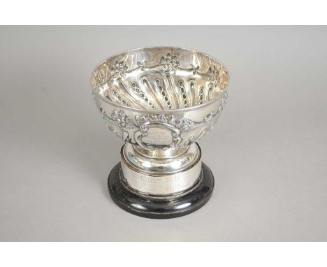 A silver presentation bowl, William Hutton &amp; Sons, London 1901, of circular pedestal from with floral embossed decoration