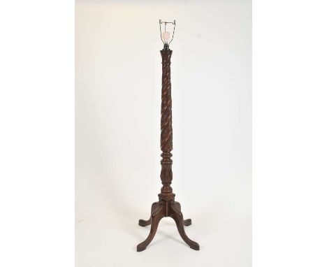 A large carved mahogany standard lamp, the wrythen acanthus carved stem raised on four heavy bladed cabriole legs, 159 cm hig