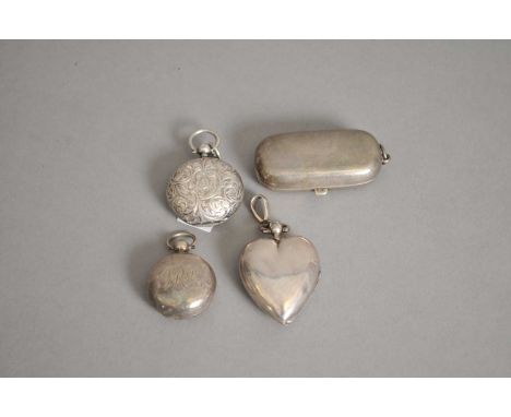 A silver sovereign case in the form of a heart, Chester 1913, together with a double silver sovereign case and two further si