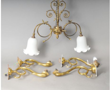 Good quality brass lighting to include two pair of scrolling brass wall sconces with stylised dolphin mounts (4) 32 x 18 cm, 