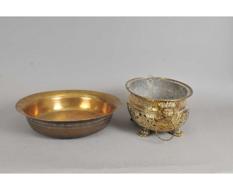 A 19th century pierced brass planter, of oval form, with pierced floral and foliate decoration, fitted with original tin line