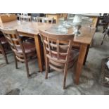 2 Square wooden tables with 4 wooden chairs