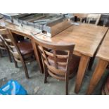 2 Square wooden tables with 4 wooden chairs