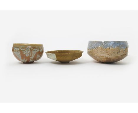Ian Godfrey (1942-1992) a flaring pottery bowl with pierced rim, incised decoration, splashed with ash glaze, a small Derek D