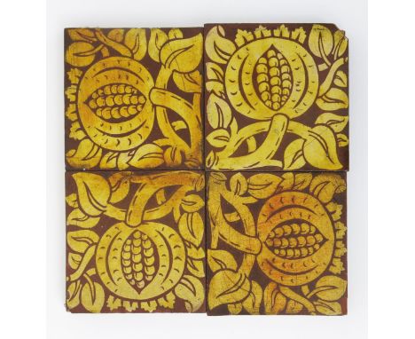 A Minton's four encaustic tile panel the design attributed to A.W.N. Pugin, decorated with  boughs of acorn and oak leaf foli