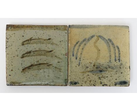Bernard Leach (1887-1979) a Leach Pottery tile, painted with three fish in tenmoku on a celadon ground, and another tile pain