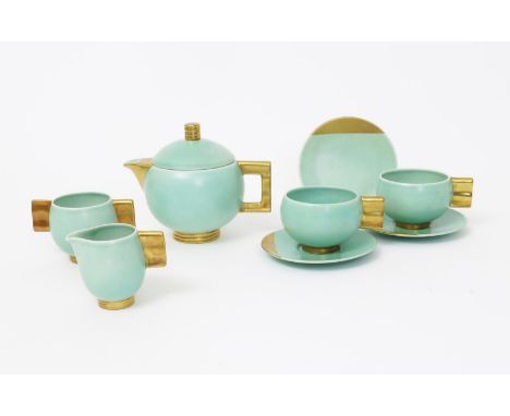 An Art Deco Carlton Ware Moderne tea for two, pattern no.8810, comprising teapot and cover, milk-jug and sugar basin, two cup