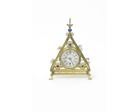 A rare  Reformed Gothic brass and lapis mantel clock designed by Bruce Talbert, probably made by Cox & Co or Hart, Son, Peard