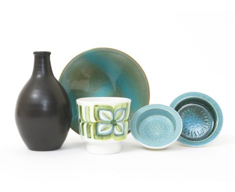 A Poole Pottery Studio bowl, covered in a sprayed turquoise and tan glaze, a Poole Studio vase, two dishes and a Poole Contem