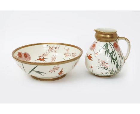 An Aesthetic Movement Doulton Burslem pottery wash basin and ewer, printed with  cranes and swallows flying past bamboo and p