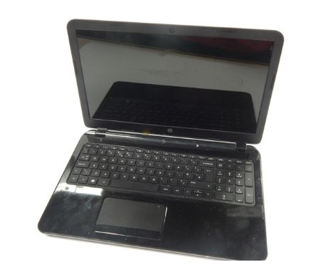 An HP Atheros Model AR5 laptop, on Windows 8, in black, used, with HP 15.5" Spectrum sleeve carry case, in original packaging