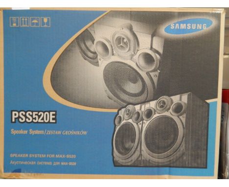 A Samsung PSS520E speaker system, in original box, together with a PYE stereo tuner double cassette midi system, (2).